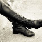 shiny black tall boots: paddock boots vs tall boots