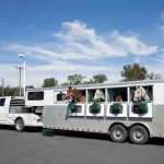 A horse trailer carrying horses