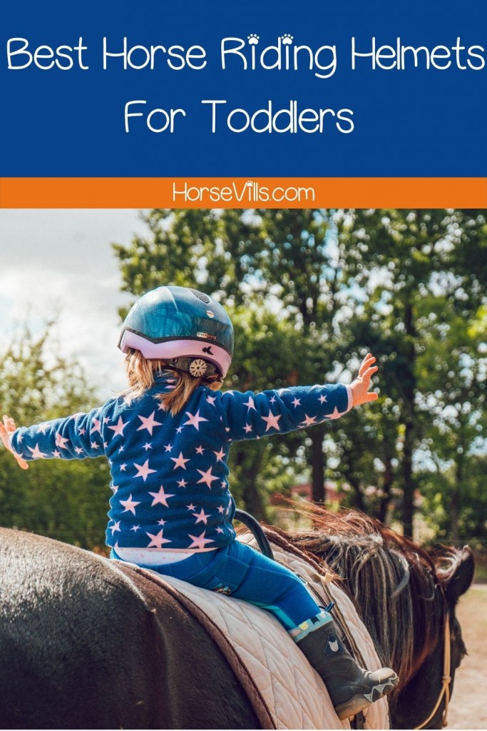 baby girl wearing a toddler horse riding helmet