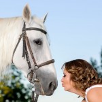 lady about to kiss the horse
